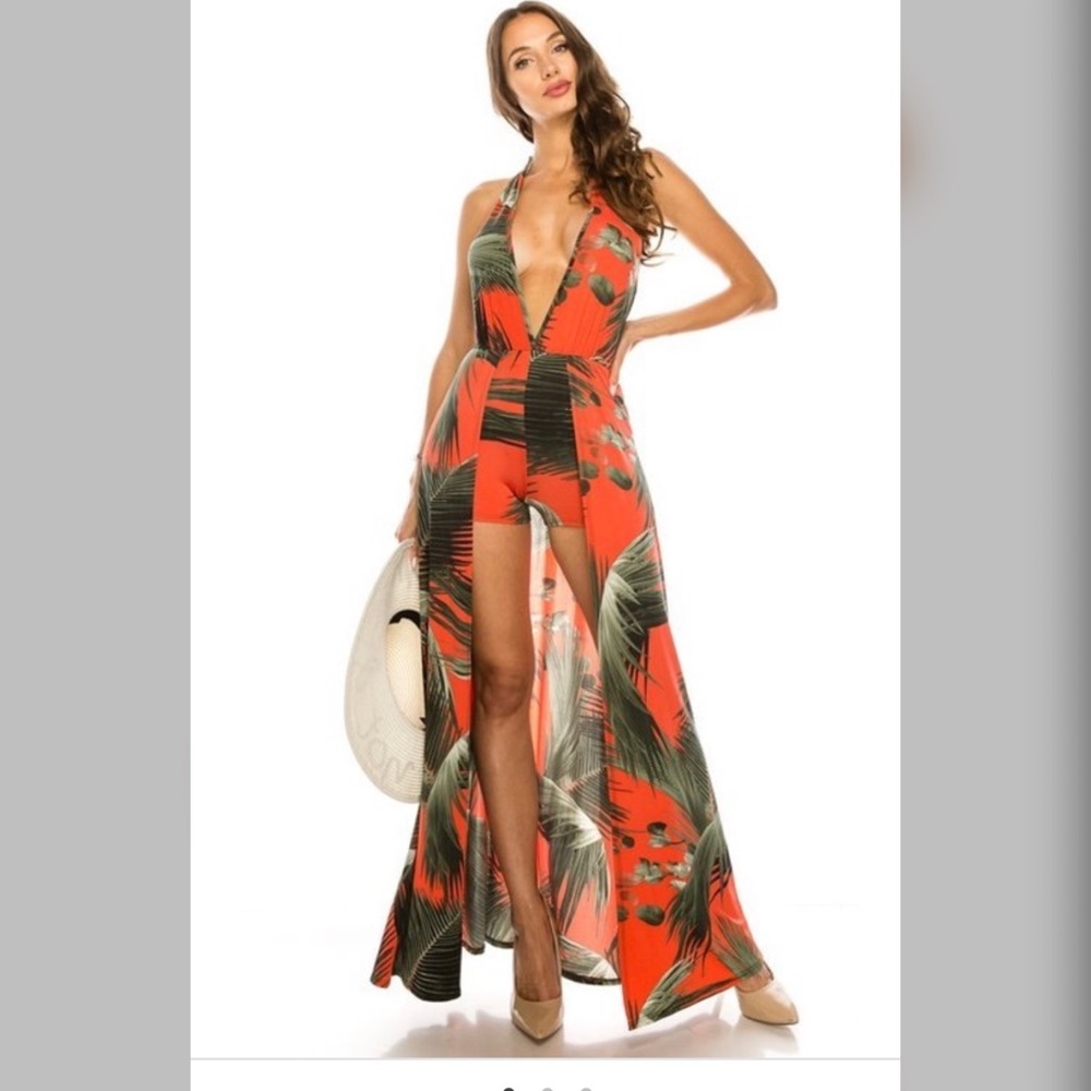 Halter neck sleeveless open back romper dress.